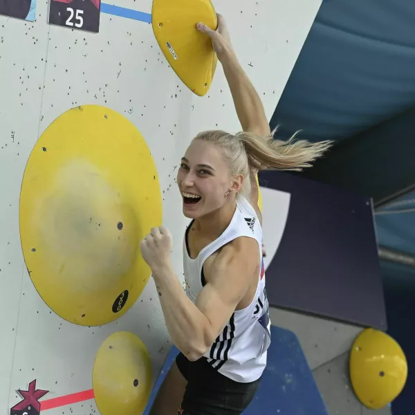 Slovenian climber Janja Garnbret cheers during the European Championship, combination, women, bouldering, final in Munich, Germany, Wednesday, Aug.17, 2022. (Angelika Warmuth/dpa via AP)