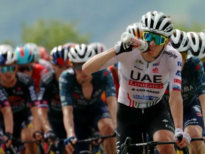 Cycling - Tour de France - Stage 1 - Florence to Rimini - Florence, Italy - June 29, 2024 UAE Team Emirates' Tadej Pogacar in action with riders during stage 1 REUTERS/Molly Darlington