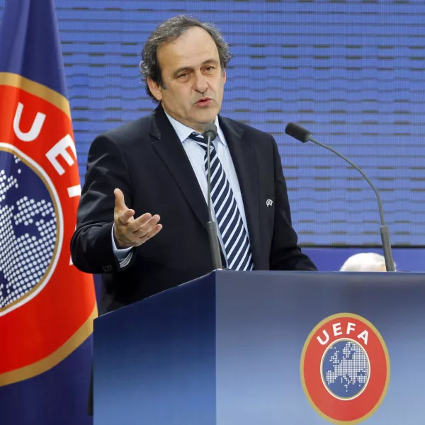 UEFA president Michel Platini of France delivers his speech after being re-elected during the 35th Ordinary UEFA Congress at the Grand Palais in Paris, France, Tuesday, March 22, 2011. Platini has been re-elected as UEFA President until 2015 by acclaim of Europe's 53 football nations. (AP Photo/Francois Mori)