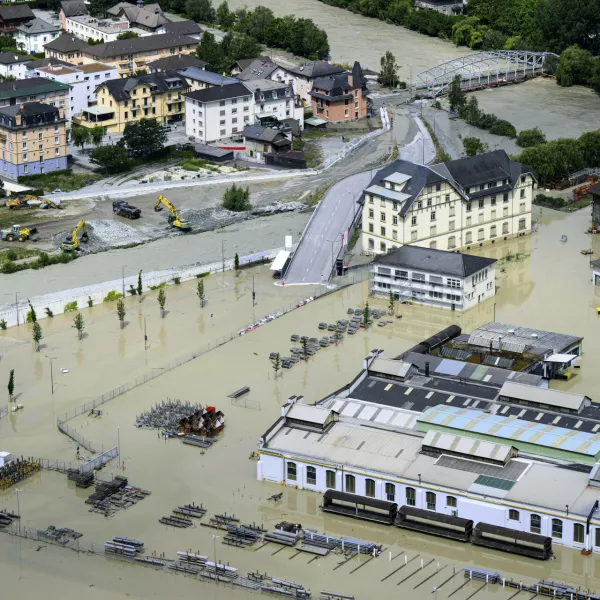 A view of the Rhone river, at right, and the Navizence river, following the storms that caused major flooding, in Chippis, Switzerland, Sunday, June 30, 2024. The Rhone river burst its banks in several areas of Valais canton, flooding a highway and a railway line. (Jean-Christophe Bott/Keystone via AP)