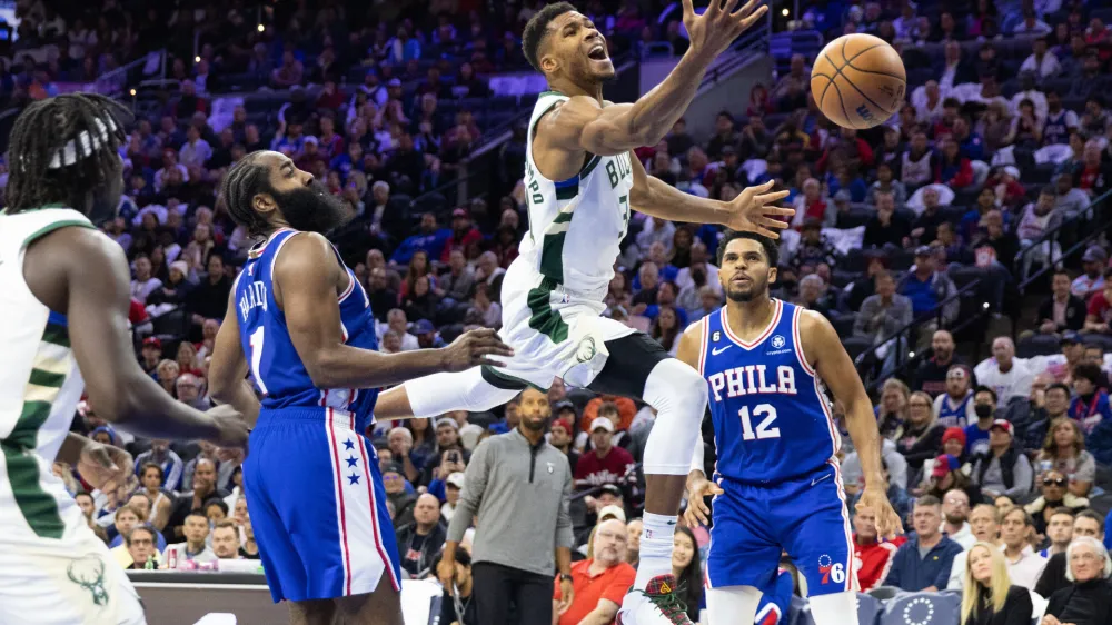 Oct 20, 2022; Philadelphia, Pennsylvania, USA; Milwaukee Bucks forward Giannis Antetokounmpo (34) looses control of the ball while driving against Philadelphia 76ers guard James Harden (1) during the third quarter at Wells Fargo Center. Mandatory Credit: Bill Streicher-USA TODAY Sports