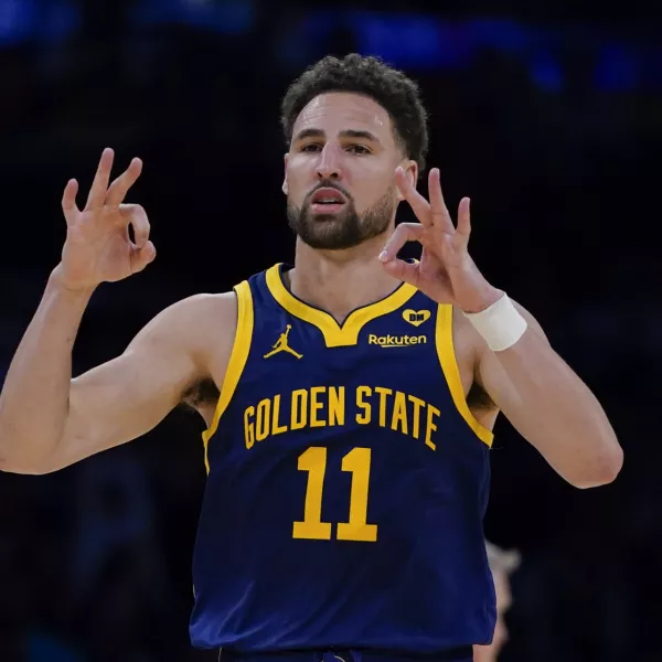 FILE - Golden State Warriors guard Klay Thompson gestures after making a 3-point basket against the Los Angeles Lakers during the second half of an NBA basketball game Tuesday, April 9, 2024, in Los Angeles. Klay Thompson is moving on from the Golden State Warriors, with the four-time league champion agreeing to join the Western Conference champion Dallas Mavericks and change franchises for the first time in his 13-year NBA career, two people with knowledge of the decision said Monday, July 1, 2024.(AP Photo/Ryan Sun)