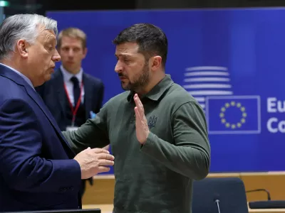 FILE PHOTO: Hungarian Prime Minister Viktor Orban and Ukraine's President Volodymyr Zelenskiy attend a European Union leaders' summit in Brussels, Belgium June 27, 2024. OLIVIER HOSLET/Pool via REUTERS/File Photo