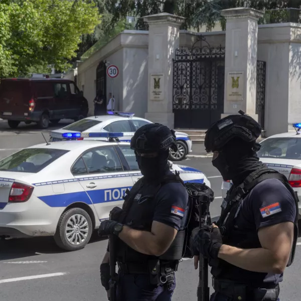 Police officers block off traffic at an intersection close to the Israeli embassy in Belgrade, Serbia, Saturday, June 29, 2024. An attacker with a crossbow has wounded a Serbian police officer guarding the Israeli Embassy in Belgrade. Serbia's interior ministry says the officer responded by fatally shooting the assailant. (AP Photo/Marko Drobnjakovic)