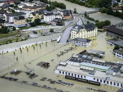 A view of the Rhone river, at right, and the Navizence river, following the storms that caused major flooding, in Chippis, Switzerland, Sunday, June 30, 2024. The Rhone river burst its banks in several areas of Valais canton, flooding a highway and a railway line. (Jean-Christophe Bott/Keystone via AP)