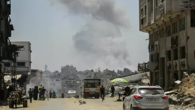 Smoke rises following Israeli strikes that hit a residential building and destroyed shops at Gaza's Old City market, amid the Israel-Hamas conflict, in Gaza City July 4, 2024. REUTERS/Mahmoud Issa