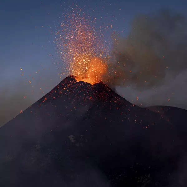 Lava rises from a crater of Mount Etna, Europe's most active volcano, Italy July 2, 2024. REUTERS/Etna Walk/Giuseppe Di Stefano