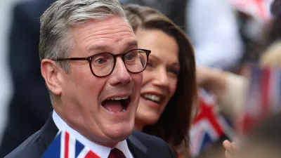 British Prime Minister Keir Starmer and his wife Victoria Starmer react as they greet Labour campaigners and activists at Number 10 Downing Street, following the results of the election, in London, Britain, July 5, 2024. REUTERS/Toby Melville