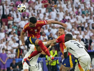 Spain's Mikel Merino (6) scores his side's second goal during a quarter final match between Germany and Spain at the Euro 2024 soccer tournament in Stuttgart, Germany, Friday, July 5, 2024. (AP Photo/Antonio Calanni)