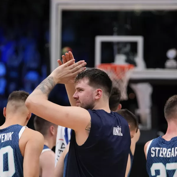 Slovenia's Luka Doncic applauds following an Acropolis tournament basketball match against Greece at the Peace and Friendship indoor stadium at Athens' port city of Piraeus, Greece, Saturday, July 6, 2024. (AP Photo/Petros Giannakouris)