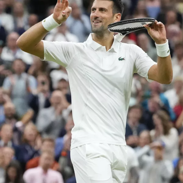 Novak Djokovic of Serbia reacts after defeating Alexei Popyrin of Australia in their third round match at the Wimbledon tennis championships in London, Saturday, July 6, 2024. (AP Photo/Kirsty Wigglesworth)