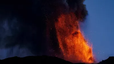 Lava and smoke rise from a crater of Mount Etna, Europe's most active volcano, Italy July 4, 2024. REUTERS/Etna Walk/Giuseppe Di Stefano