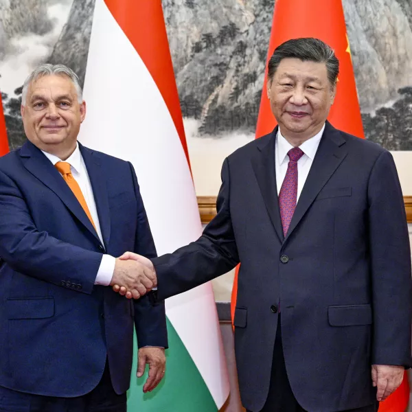 In this photo released by Xinhua News Agency, Hungarian Prime Minister Viktor Orban, left, shakes hands with Chinese President Xi Jinping before a meeting at the Diaoyutai State Guesthouse in Beijing, Monday, July 8, 2024. (Li Xueren/Xinhua via AP)