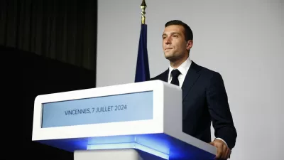 Jordan Bardella, President of the French far-right Rassemblement National (National Rally - RN) party, delivers a speech on stage after partial results in the second round of the early French parliamentary elections in Paris, France, July 7, 2024. REUTERS/Sarah Meyssonnier