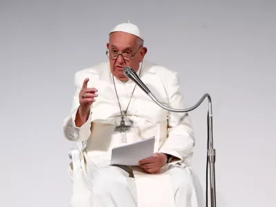 FILE PHOTO: Pope Francis speaks at the 50th Social Week of Catholics at the "Generali Convention Center" in Trieste, Italy, July 7, 2024. REUTERS/Alessandro Garofalo/File Photo