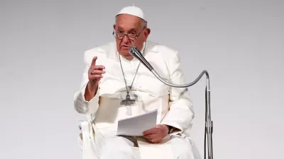 FILE PHOTO: Pope Francis speaks at the 50th Social Week of Catholics at the "Generali Convention Center" in Trieste, Italy, July 7, 2024. REUTERS/Alessandro Garofalo/File Photo