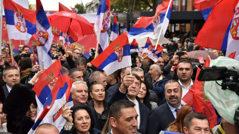 People wave Serbian flags as they protest following local Serbs' decision to leave Kosovo institutions, in North Mitrovica, Kosovo, November 6, 2022. REUTERS/Laura Hasani