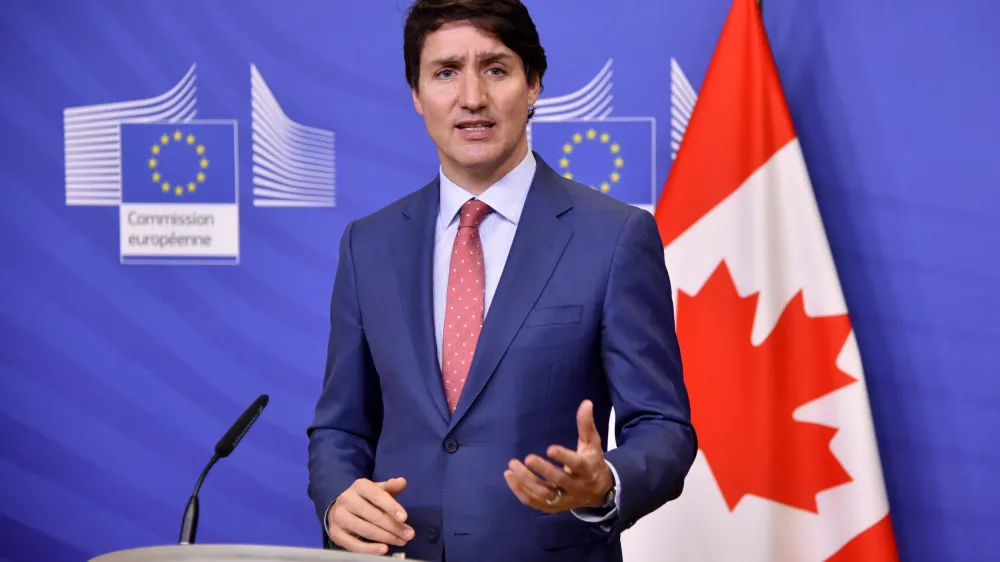 Canadian Prime Minister Justin Trudeau delivers a media statement at EU headquarters in Brussels, Wednesday, March 23, 2022. Canadian Prime Minister Justin Trudeau is in Brussels to attend an extraordinary NATO summit which will take place on Thursday. (AP Photo/Geert Vanden Wijngaert, Pool)