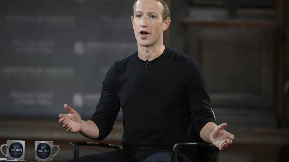 FILE - Facebook CEO Mark Zuckerberg speaks at Georgetown University in Washington, Thursday, Oct. 17, 2019. Facebook parent Meta is laying off 11,000 people, about 13% of its workforce, as it contends with faltering revenue and broader tech industry woes, Zuckerberg said in a letter to employees Wednesday. (AP Photo/Nick Wass, File)