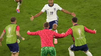 England's Ollie Watkins celebrates after scoring his side's second goal during a semifinal match between the Netherlands and England at the Euro 2024 soccer tournament in Dortmund, Germany, Wednesday, July 10, 2024. (AP Photo/Andreea Alexandru)