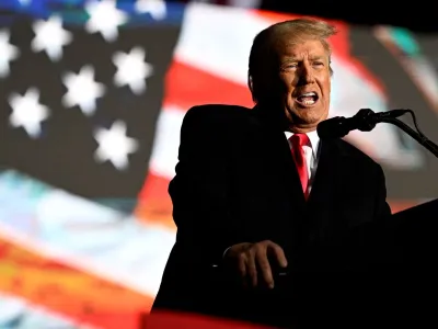 FILE PHOTO: Former U.S. President Donald Trump speaks at a rally to support Republican candidates ahead of midterm elections, in Dayton, Ohio, U.S. November 7, 2022. REUTERS/Gaelen Morse/File Photo