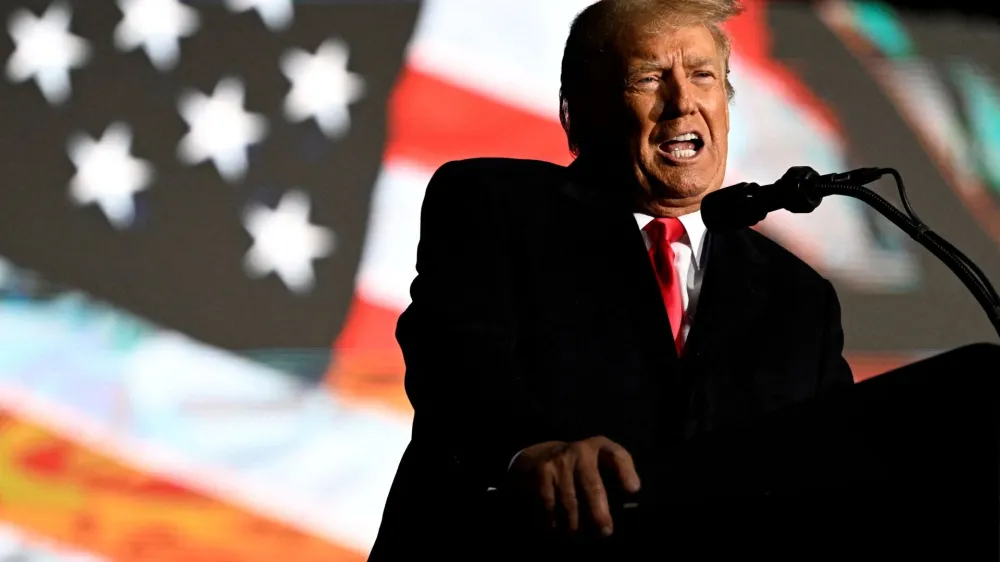 FILE PHOTO: Former U.S. President Donald Trump speaks at a rally to support Republican candidates ahead of midterm elections, in Dayton, Ohio, U.S. November 7, 2022. REUTERS/Gaelen Morse/File Photo