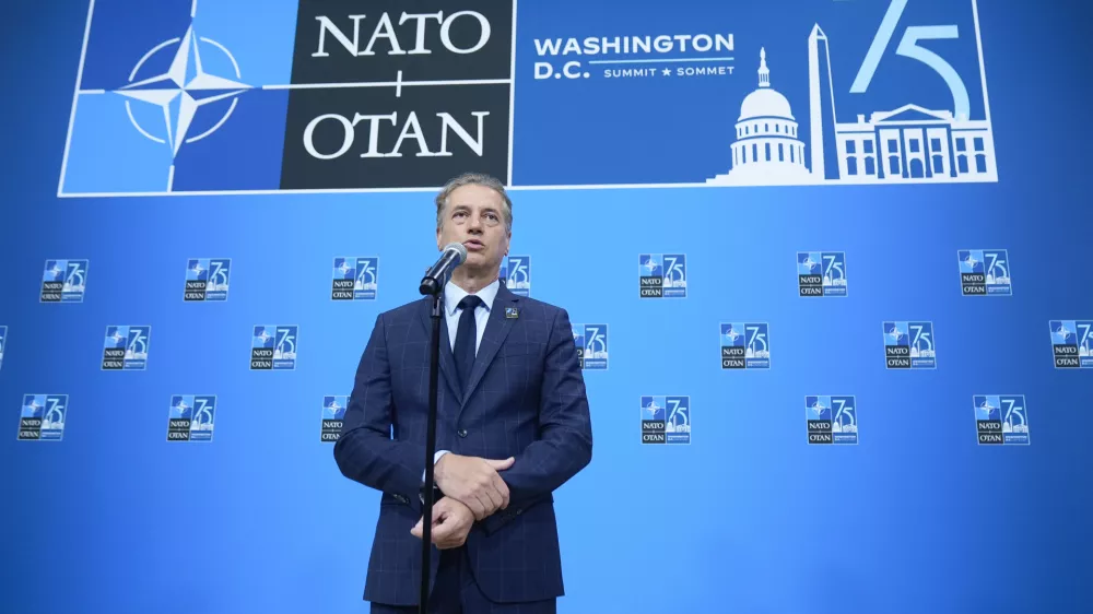 Slovenia's Prime Minister Robert Golob delivering remarks during his arriving at the NATO summit in Washington, Thursday, July 11, 2024. (AP Photo/Mark Schiefelbein)