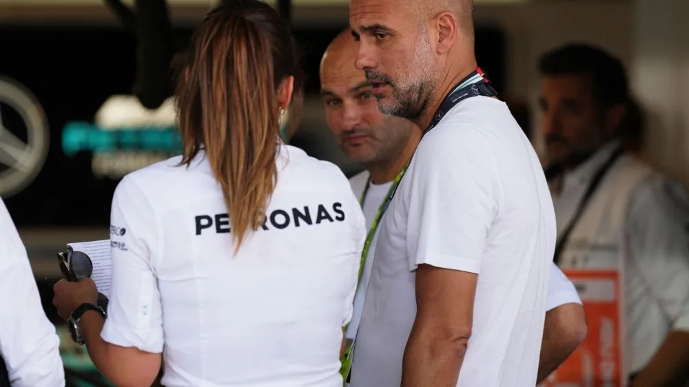 Formula One F1 - Abu Dhabi Grand Prix - Yas Marina Circuit, Abu Dhabi, United Arab Emirates - November 20, 2022 Manchester City manager Pep Guardiola is pictured at the Mercedes garage ahead the race REUTERS/Aleksandra Szmigiel