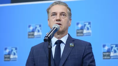 Slovenia's Prime Minister Robert Golob delivering remarks during his arriving at the NATO summit in Washington, Thursday, July 11, 2024. (AP Photo/Mark Schiefelbein)