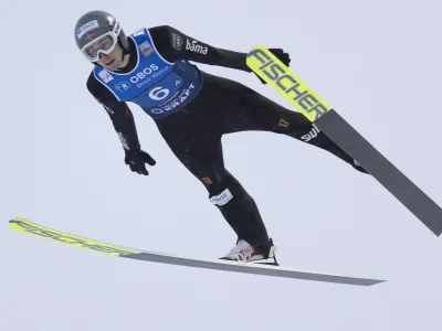 Norway's Jarl Magnus Riiber takes part in the team combined ski jumping competition during the World Cup races in Lillehammer, Norway, Saturday, Dec. 4, 2021. (Geir Olsen/NTB Scanpix via AP)