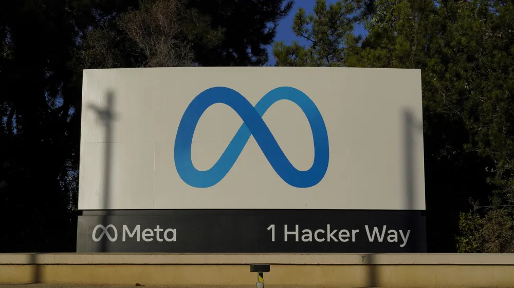 FILE - Meta's logo can be seen on a sign at the company's headquarters in Menlo Park, Calif., on Nov. 9, 2022. Irish regulators slapped Facebook parent Meta with a 265 million euro ($277 million) fine Monday, Nov. 28, 2022 the company's latest punishment for breaching strict European Union data privacy rules. (AP Photo/Godofredo A. Vásquez, File)