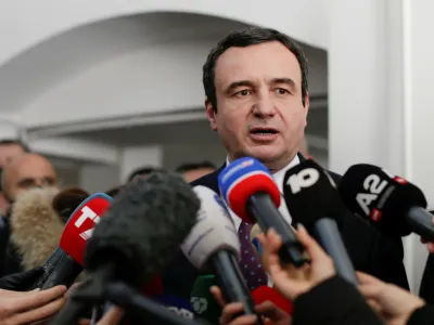 ﻿Albin Kurti, leader of Vetevendosje (Self-determination) party speaks to the media after voting during parliamentary elections in Pristina, Kosovo, February 14, 2021. REUTERS/Florion Goga