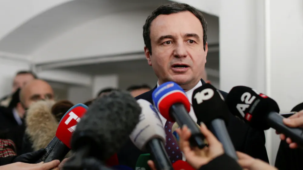 ﻿Albin Kurti, leader of Vetevendosje (Self-determination) party speaks to the media after voting during parliamentary elections in Pristina, Kosovo, February 14, 2021. REUTERS/Florion Goga