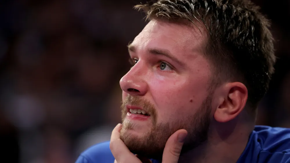 Dec 3, 2022; New York, New York, USA; Dallas Mavericks guard Luka Doncic (77) watches from the bench during the second quarter against the New York Knicks at Madison Square Garden. Mandatory Credit: Brad Penner-USA TODAY Sports