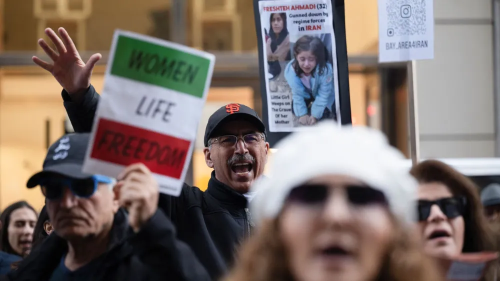 A man shouts out chants during a protest against gender-based violence in Iran, in front of the United Nations Children's Fund (UNICEF) office in San Francisco, California, U.S., November 30, 2022. REUTERS/Amy Osborne