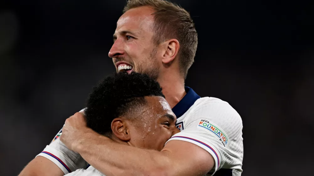 10 July 2024, North Rhine-Westphalia, Dortmund: England's Ollie Watkins (below) and England's Harry Kane celebrate after the win of the UEFA Euro 2024 Semi-final soccer match between Netherlands and England at BVB Stadion Dortmund. Photo: Bernd Thissen/dpa