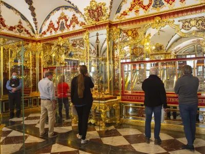 FILE - Visitors stand in the Jewel Room during the reopening of the Green Vault Museum in Dresden's Royal Palace of the Dresden State Art Collections (SKD) in Dresden, Germany, May 30, 2020. German authorities said Saturday Dec. 17, 2022, that they have recovered a significant part of the 18th-century treasures stolen from Dresden's Green Vault museum in a spectacular break-in more than three years ago. (AP Photo/Jens Meyer, file)