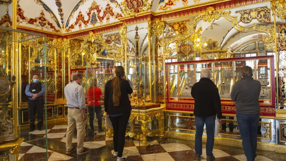 FILE - Visitors stand in the Jewel Room during the reopening of the Green Vault Museum in Dresden's Royal Palace of the Dresden State Art Collections (SKD) in Dresden, Germany, May 30, 2020. German authorities said Saturday Dec. 17, 2022, that they have recovered a significant part of the 18th-century treasures stolen from Dresden's Green Vault museum in a spectacular break-in more than three years ago. (AP Photo/Jens Meyer, file)