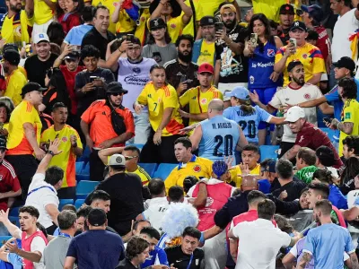 FILE PHOTO: Jul 10, 2024; Charlotte, NC, USA; Fans get into an altercation with players and staff from Uruguay after the Copa Armerica Semifinal match between Uruguay and Colombia at Bank of America Stadium. Mandatory Credit: Jim Dedmon-USA TODAY Sports/File Photo