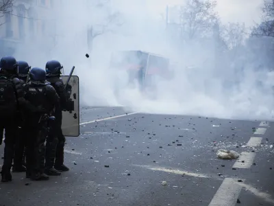 24 December 2022, France, Paris: Police use tear gas against demonstrators during clashes between them, following the death of three people when shots were fired at a Kurdish community centre in central Paris in what could be a racist attack. Photo: Remon Haazen/ZUMA Press Wire/dpa