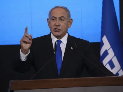 FILE - Benjamin Netanyahu, former Israeli Prime Minister and the head of Likud party, speaks to his supporters after first exit poll results for the Israeli Parliamentary election at his party's headquarters in Jerusalem on Nov. 2, 2022. Netanyahu's Likud party released the new government's policy guidelines on Wednesday, Dec. 28, 2022. Netanyahu's incoming hard-line government has put West Bank settlement expansion at the top of its list of priorities a day before it's set to be sworn into office. (AP Photo/Oren Ziv, File)