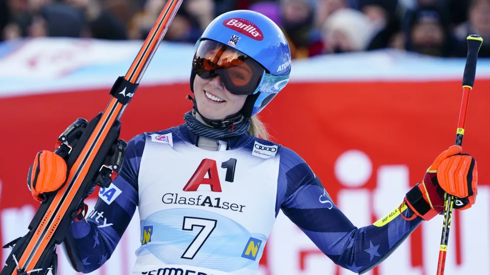 United States' Mikaela Shiffrin celebrates winning an alpine ski, women's World Cup giant slalom, in Semmering, Austria, Wednesday, Dec.28, 2022. (AP Photo/Piermarco Tacca)