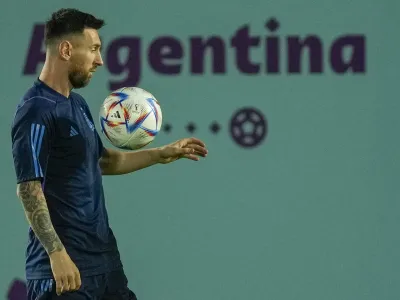 Argentina's Lionel Messi controls a ball during a training session on the eve of the round of sixteen World Cup soccer match between Argentina and Australia, in Doha, Qatar, Friday, Dec. 2, 2022. (AP Photo/Jorge Saenz)