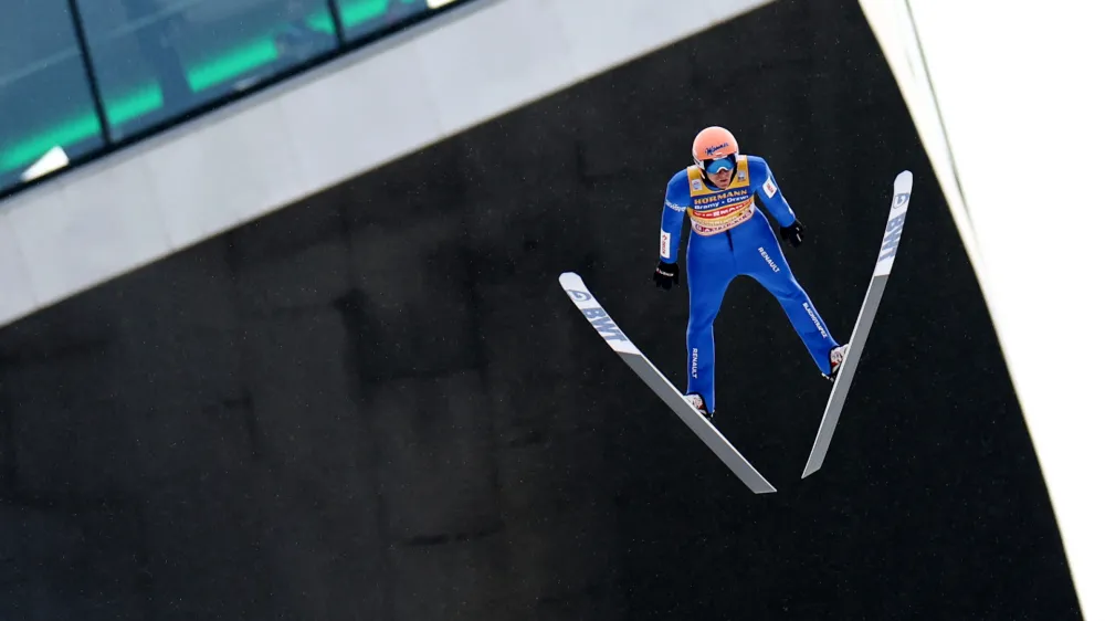 Ski Jumping - Four Hills Tournament - Innsbruck, Austria - January 3, 2023 Poland's Dawid Kubacki in action REUTERS/Lisi Niesner