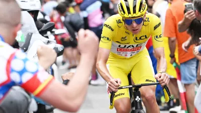 13 July 2024, France, Saint-Lary-Soulan Pla D'adet: Slovenian Tadej Pogacar of UAE Team Emirates on his way to win stage 14 of the 2024 Tour de France cycling race, from Pau to Saint-Lary-Soulan Pla d'Adet. Photo: Pool Bernard Papon/Belga/dpa