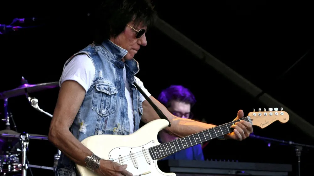 FILE PHOTO: Musician Jeff Beck performs with actor Johnny Depp (not pictured) during the Helsinki Blues Festival in Helsinki, Finland, June 19, 2022. Lehtikuva/Jussi Nukari via REUTERS   ATTENTION EDITORS - THIS IMAGE WAS PROVIDED BY A THIRD PARTY. NO THIRD PARTY SALES. NOT FOR USE BY REUTERS THIRD PARTY DISTRIBUTORS. FINLAND OUT. NO COMMERCIAL OR EDITORIAL SALES IN FINLAND./File Photo