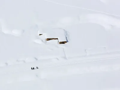 ﻿A house is covered with snow from an avalanche in the Paryan district of Panjshir province, north of Kabul, Afghanistan, Friday, Feb. 27, 2015. The death toll from severe weather that caused avalanches and flooding across much of Afghanistan has jumped to more than 200 people, and the number is expected to climb with cold weather and difficult conditions hampering rescue efforts, relief workers and U.N. officials said Friday. (AP Photo/Rahmat Gul)