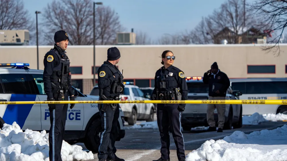 Des Moines police investigate a fatal multiple-injury shooting at Starts Right Here, a nonprofit educational mentorship program that helps at-risk metro Des Moines youth, in Des Moines, Iowa, U.S. January 23, 2023. Zach Boyden-Holmes/USA TODAY NETWORK via REUTERS NO RESALES. NO ARCHIVES. MANDATORY CREDIT