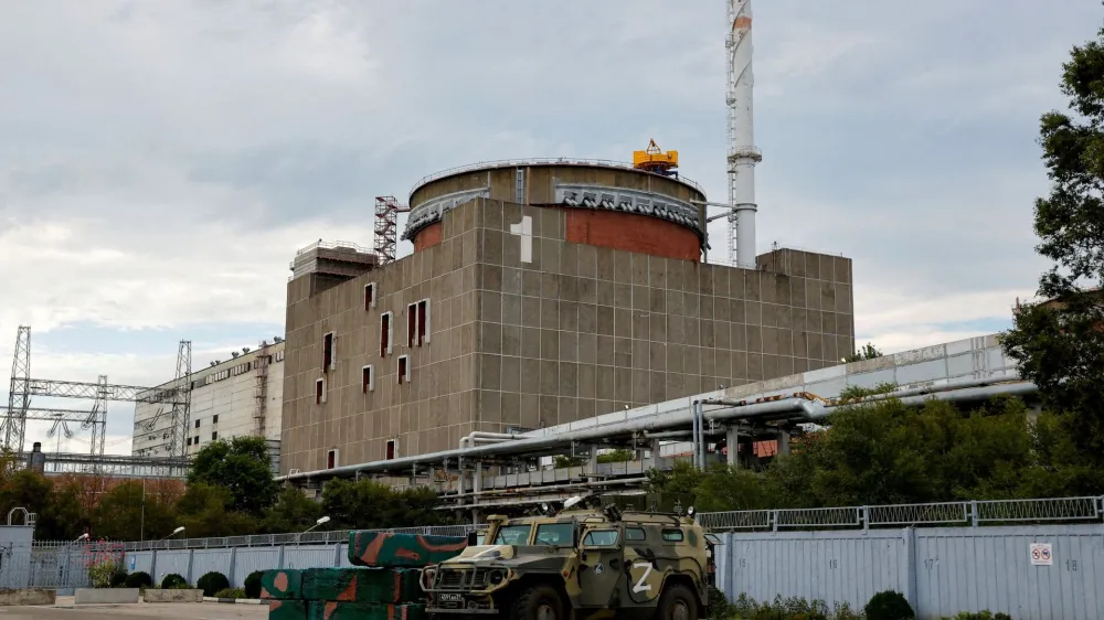 FILE PHOTO: A Russian all-terrain armoured vehicle is parked outside the Zaporizhzhia Nuclear Power Plant during the visit of the International Atomic Energy Agency (IAEA) expert mission in the course of Ukraine-Russia conflict outside Enerhodar in the Zaporizhzhia region, Ukraine, September 1, 2022. REUTERS/Alexander Ermochenko/File Photo