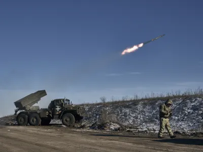 Ukrainian army Grad multiple rocket launcher fires rockets at Russian positions in the frontline near Soledar, Donetsk region, Ukraine, Wednesday, Jan. 11, 2023. (AP Photo/Libkos)